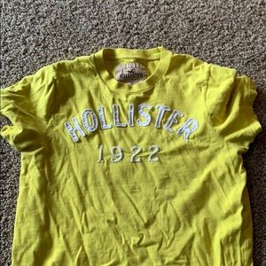 Yellow hollister logo tee size medium